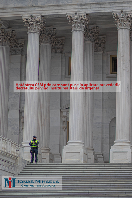 a-police-officer-standing-near-white-concrete-pillars-of-a-3659582.png